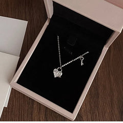 Sterling Silver Love Key Necklace worn to showcase its length and pendant detail