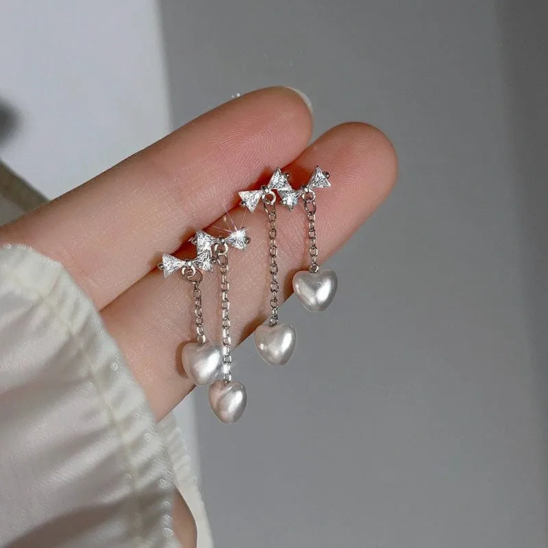 Close-up detail of the sparkling zircons and plating on the Lotus Tassel Necklace