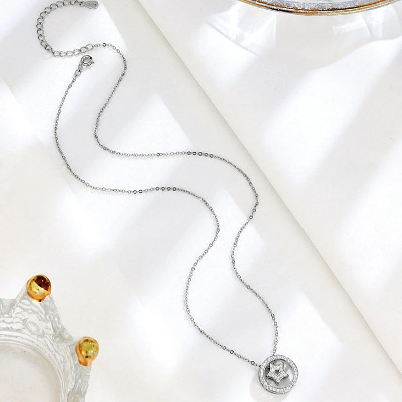 Detailed view of the Sterling Silver Luxury Diamond Circle Star Necklace chain and pendant