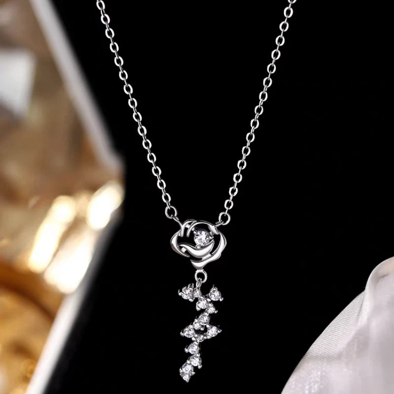 Close-up of the pendant and clasp on the Pearl Threader Earrings