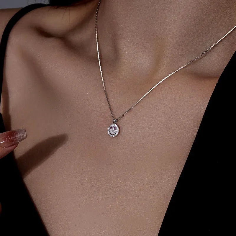 Close-up of the pendant and clasp on the Bow Heart Earrings