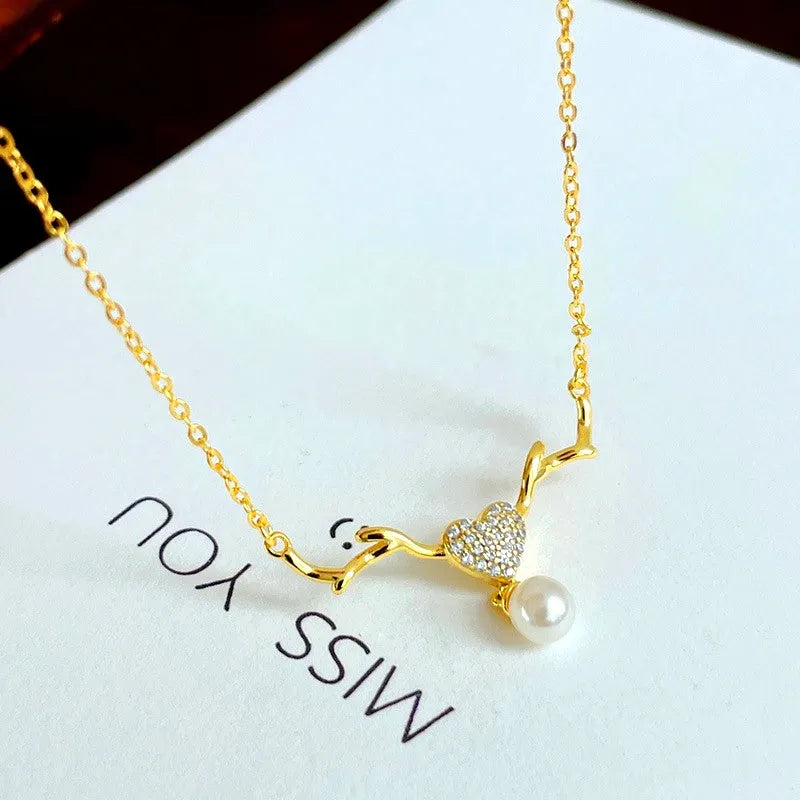 Detailed view of the Sterling Silver Luxury Elk Diamond Heart Pearl Necklace chain and pendant