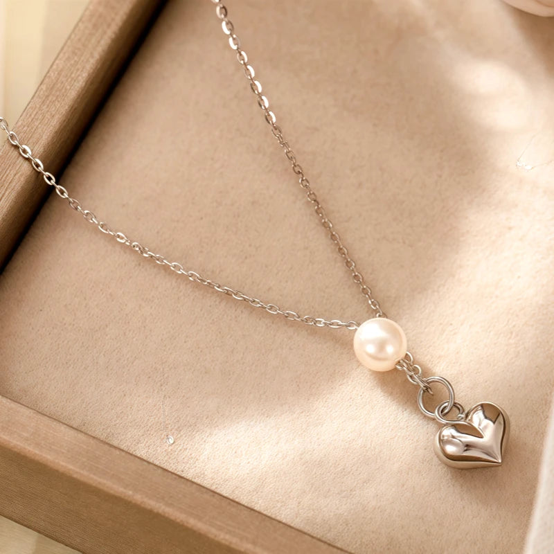 Sterling Silver Luxury Heart Pearl Necklace worn to showcase its length and pendant detail