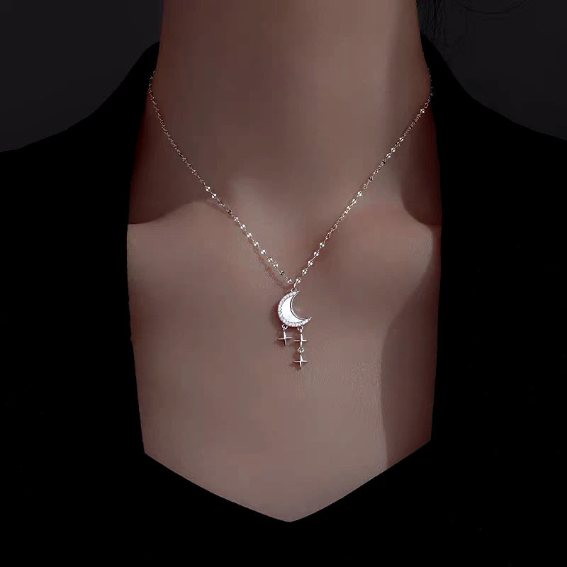 Sterling Silver Luxury Moon And Star Necklace worn to showcase its length and pendant detail
