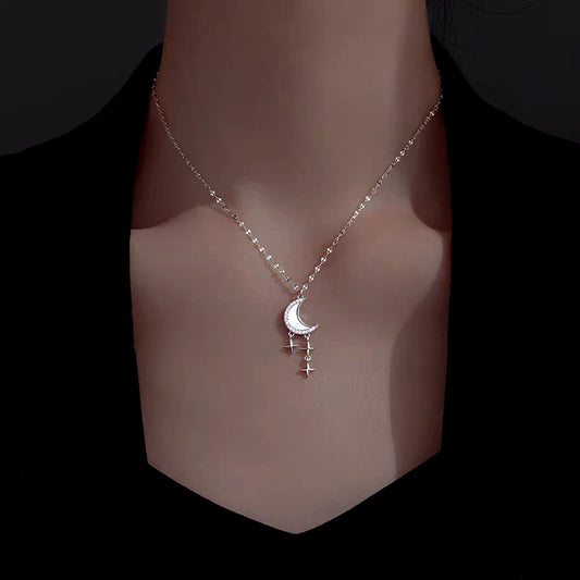 Sterling Silver Luxury Moon And Star Necklace worn to showcase its length and pendant detail