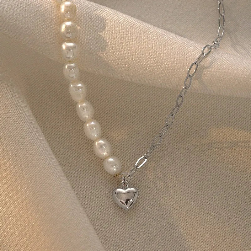 Close-up of the pendant and clasp on the Pearl Heart Necklace
