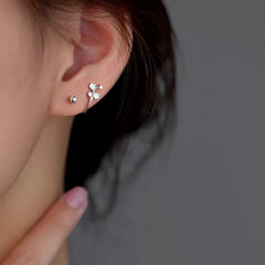 Close-up detail of the sparkling zircons and plating on the Peach Blossom Earrings