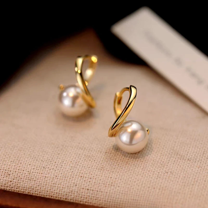 Angled view of the Sterling Silver Luxury Pearl Earrings