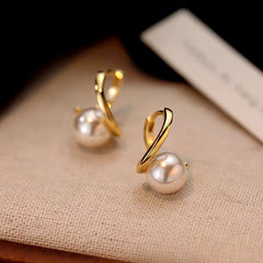 Angled view of the Sterling Silver Luxury Pearl Earrings