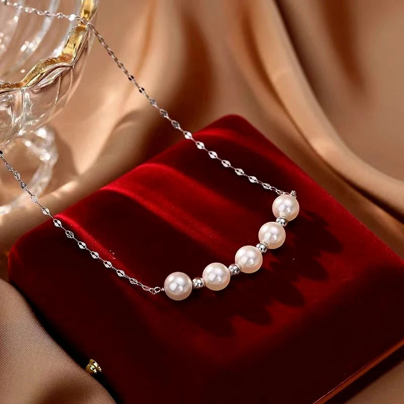 Close-up of the pendant and clasp on the Sterling Silver Pearl Necklace