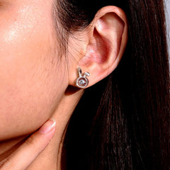 Close-up detail of the sparkling zircons and plating on the Rabbit Stud Earrings