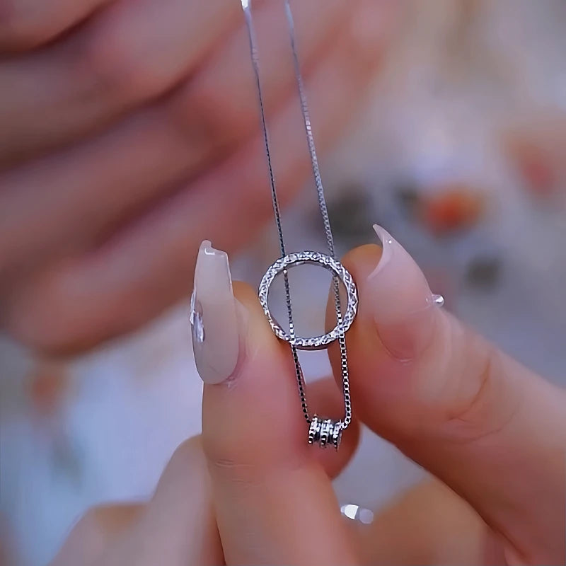 Detailed view of the Sterling Silver Luxury Small Waist Circle Necklace chain and pendant