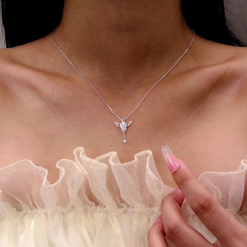 Close-up of the pendant and clasp on the Angel Wing Necklace