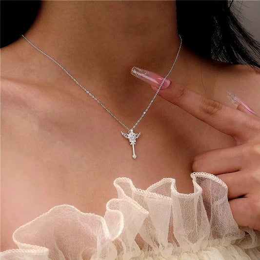 Sterling Silver Luxury Zircon Angel Wing Fairy Wand Necklace worn to showcase its length and pendant detail