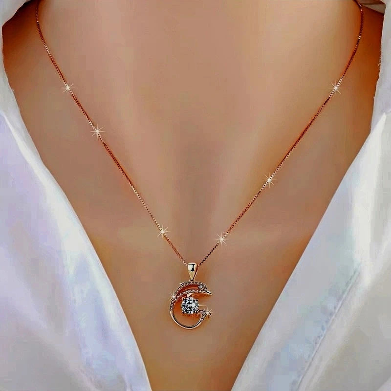 Close-up of the pendant and clasp on the Zircon Dolphin Necklace