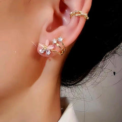 Model showcasing the dangle and style of the Sterling Silver Luxury Zircon Flower Studs