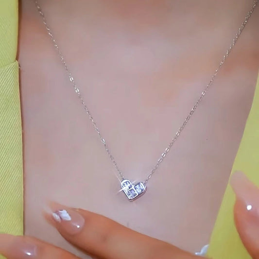 Sterling Silver Luxury Zircon Geometric Heart Clavicle Necklace worn to showcase its length and pendant detail