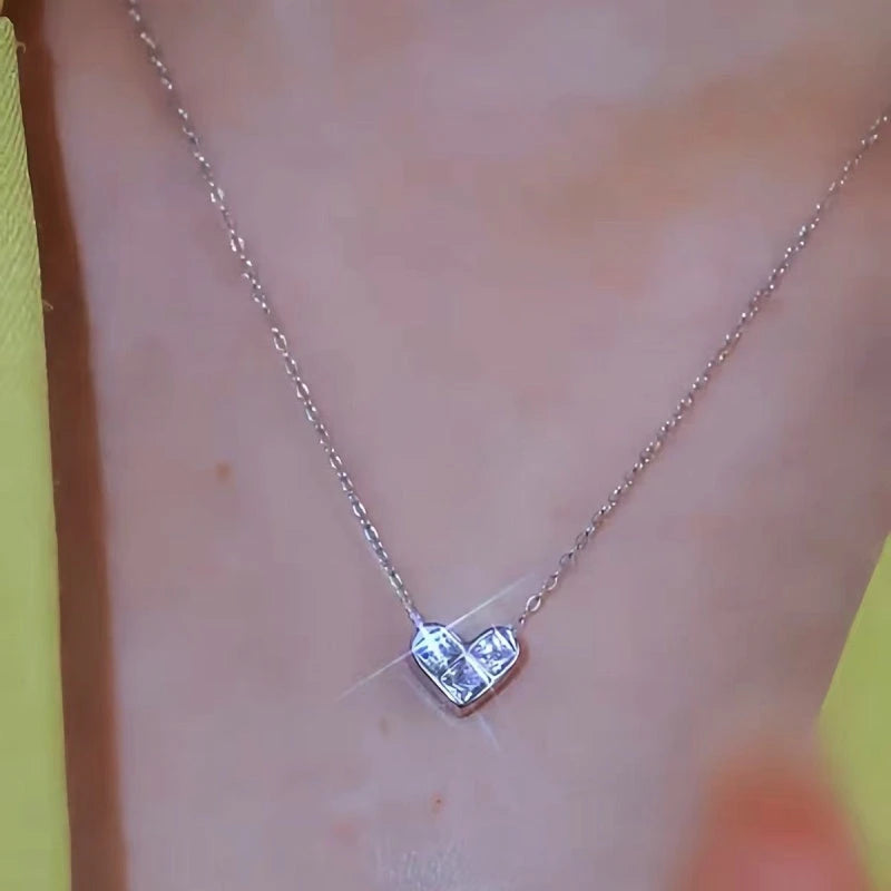 Close-up of the pendant and clasp on the Geometric Heart Necklace