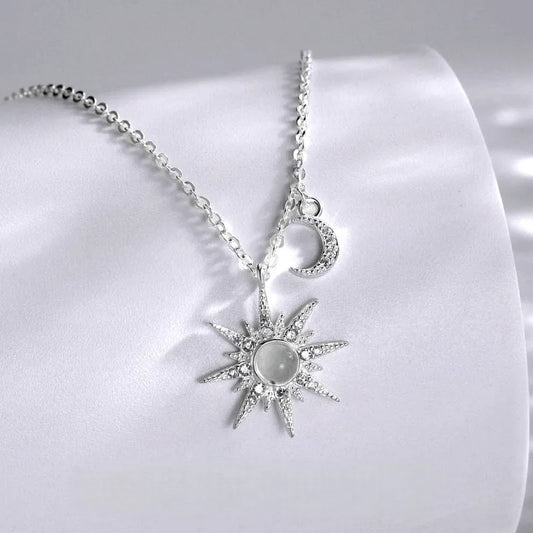 Sterling Silver Luxury Zircon Star And Moon Necklace worn to showcase its length and pendant detail