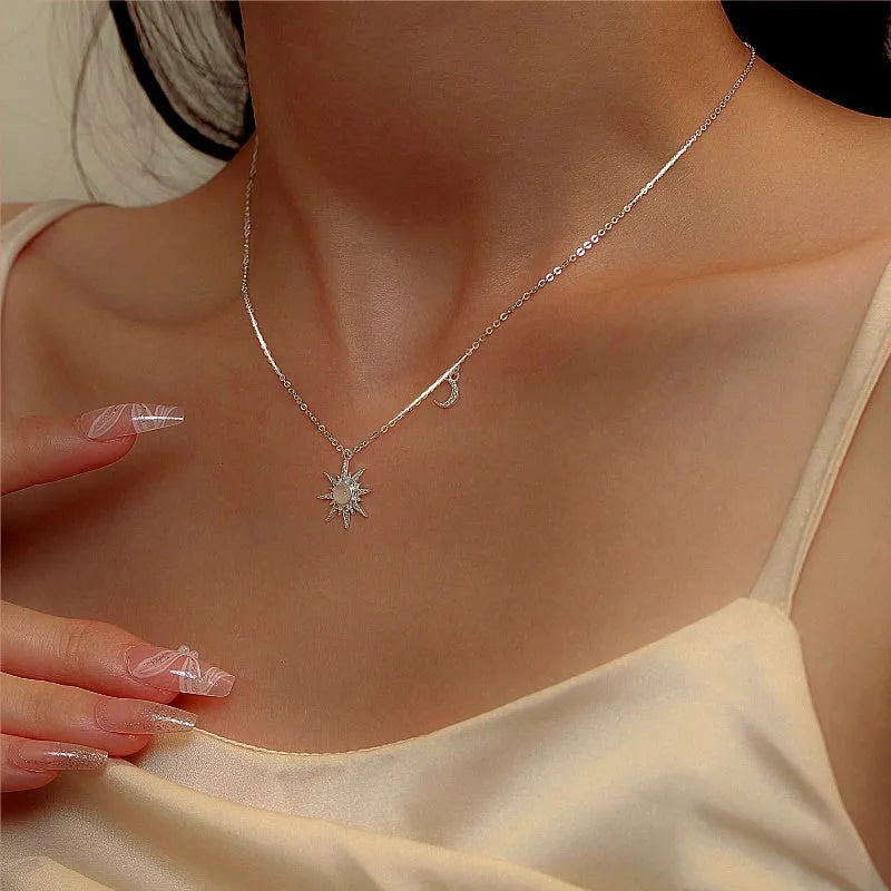 Close-up of the pendant and clasp on the Star and Moon Necklace