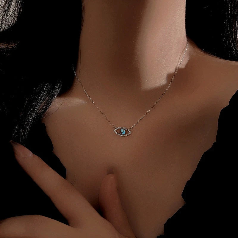 Sterling Silver Moonstone Devil's Eye Necklace worn to showcase its length and pendant detail