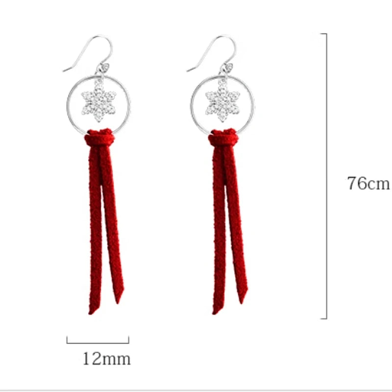 Close-up detail of the sparkling zircons and plating on the Christmas Tassel Earrings
