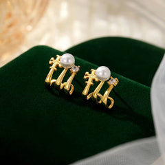 Angled view of the Sterling Silver Multi-Layer Pearl Studs