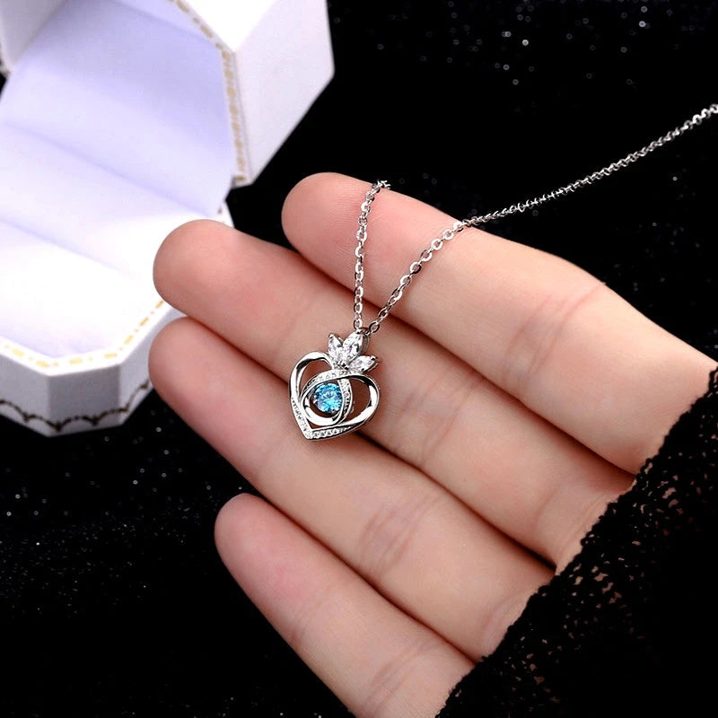 Detailed view of the Sterling Silver Ocean Heart Crown Necklace chain and pendant