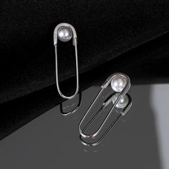 Angled view of the Sterling Silver Paper Clip Imitation Pearl Earrings
