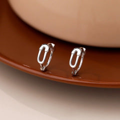 Model showcasing the dangle and style of the Sterling Silver Personalized Pin Earrings