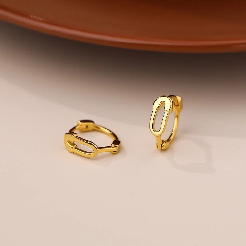 Close-up detail of the sparkling zircons and plating on the Safety Pin Earrings