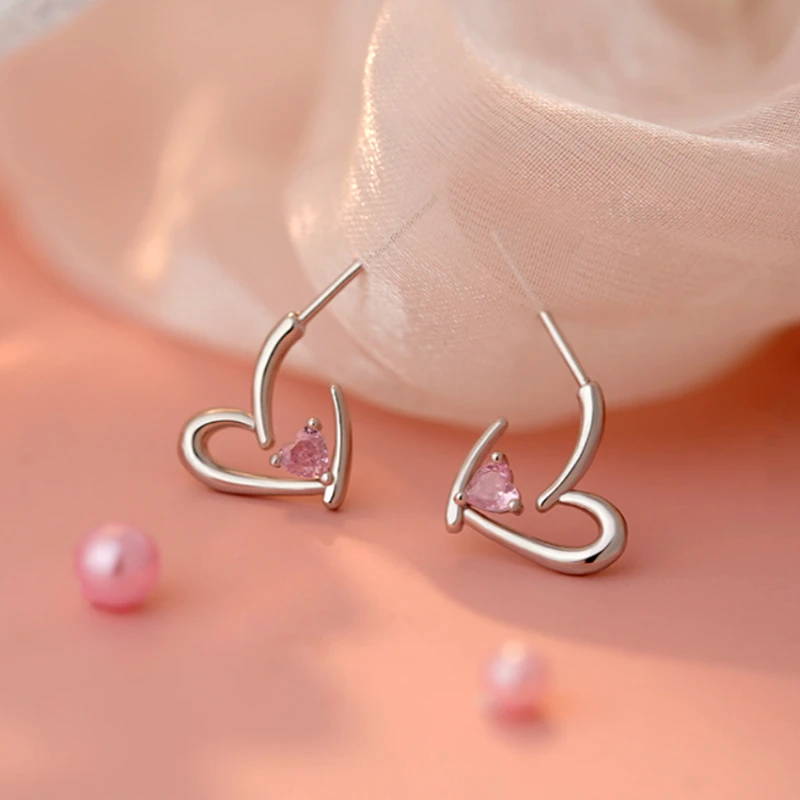 Angled view of the Sterling Silver Pink Diamond Heart Earrings