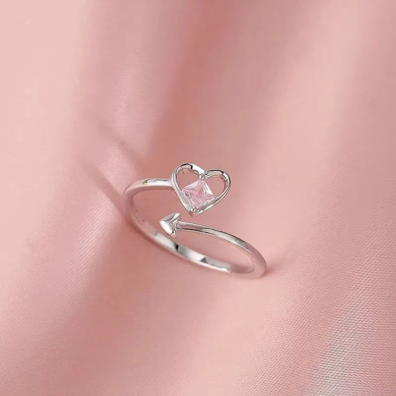 Sterling Silver Pink Diamond Heart Rings worn on the hand to show its beautiful fit and design