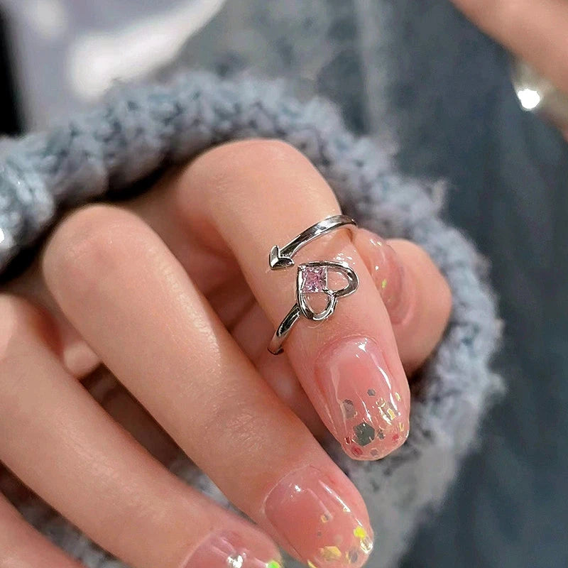 Close-up view of the gemstone and setting of the Pink Heart Ring