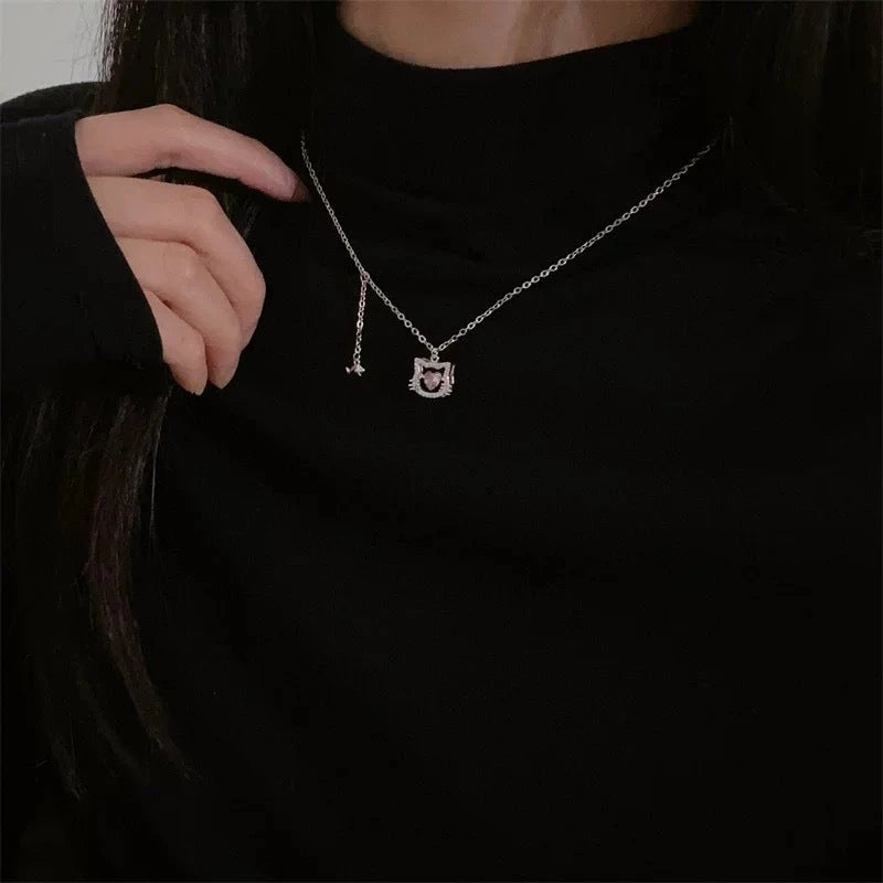 Close-up of the pendant and clasp on the Pink Kitten Necklace