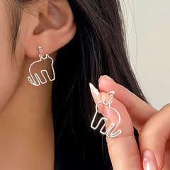 Close-up detail of the sparkling zircons and plating on the Puppy Cat Earrings