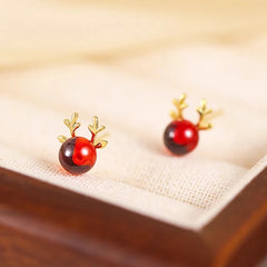 Angled view of the Sterling Silver Red Deer Antler Earrings