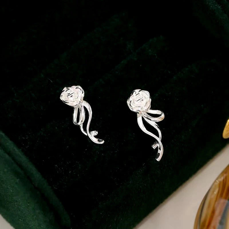 Close-up detail of the sparkling zircons and plating on the Rose Flower Earrings