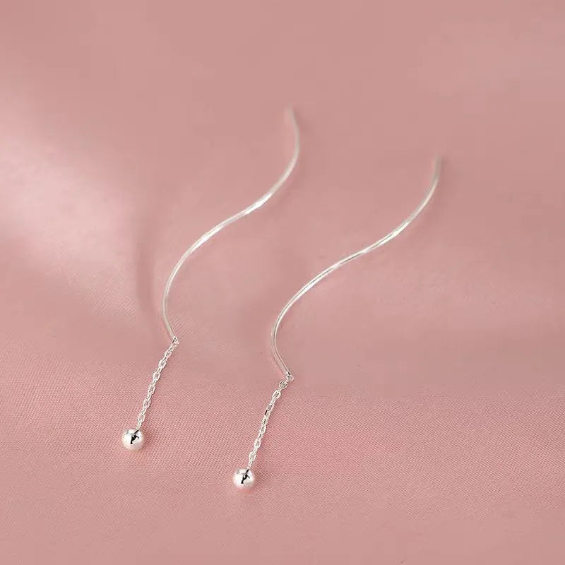 Close-up detail of the sparkling zircons and plating on the Bead Threader Earrings