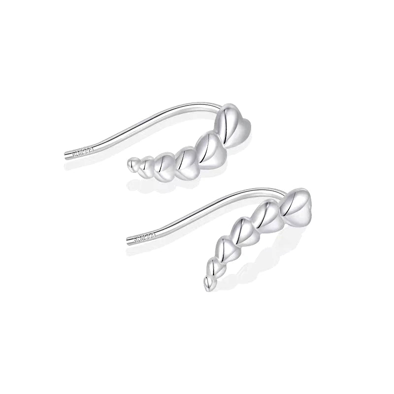 Close-up detail of the sparkling zircons and plating on the Heart Crawler Earrings