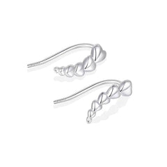 Close-up detail of the sparkling zircons and plating on the Heart Crawler Earrings