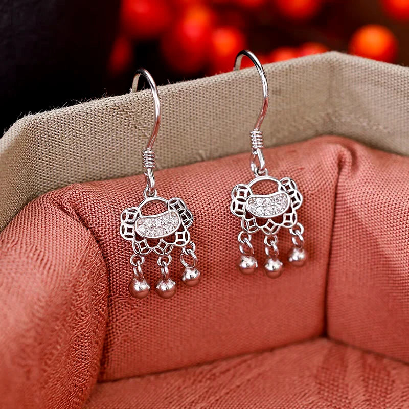 Close-up detail of the sparkling zircons and plating on the Safety Lock Earrings