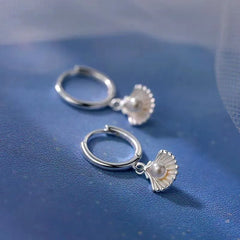 Angled view of the Sterling Silver Shell Pearl Earrings