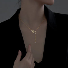 Sterling Silver Simple Star Tassel Necklace worn to showcase its length and pendant detail