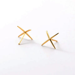 Model showcasing the dangle and style of the Sterling Silver Simple X-Shaped Stud Earrings