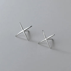 Close-up detail of the sparkling zircons and plating on the X Shaped Studs