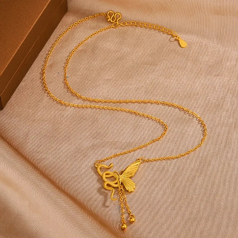 Detailed view of the Sterling Silver Snake And Butterfly Tassel Necklace chain and pendant