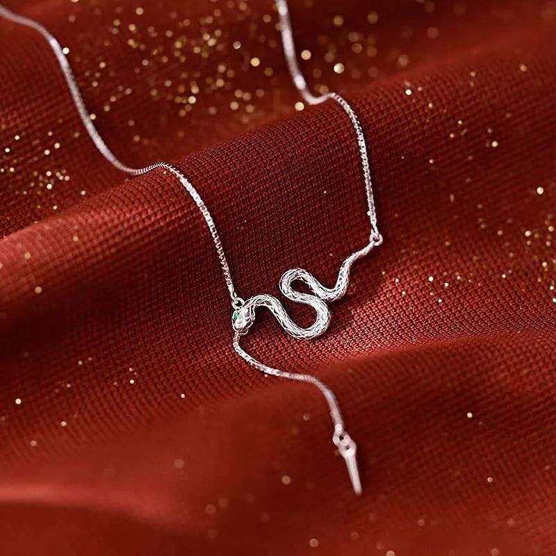 Close-up of the pendant and clasp on the Dancing Snake Necklace