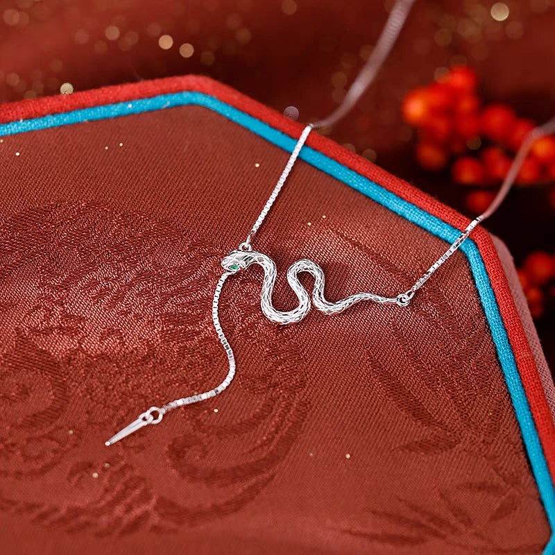 Detailed view of the Sterling Silver Snake Dancing Necklace chain and pendant