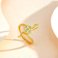 Sterling Silver Snake Diamond-Encrusted Rotating Copper Coin Rings worn on the hand to show its beautiful fit and design